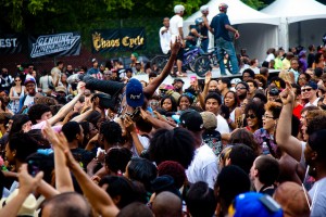 Crowdsurfing and bike stunts at AfroPunk 2012. Photo by Versus And Company.
